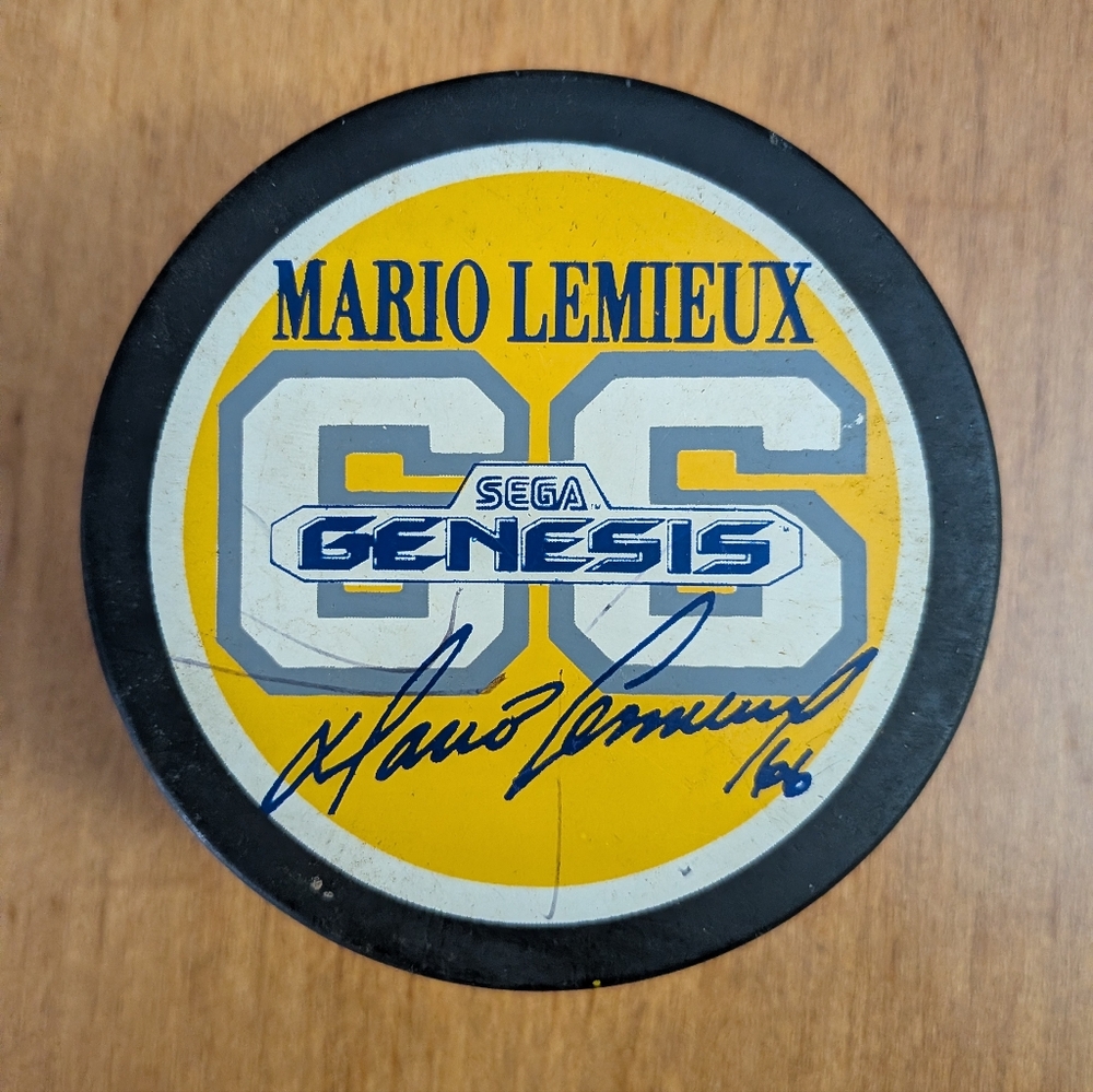 SEGA Genesis Mario Lemieux Hockey Puck - Yellow and Black